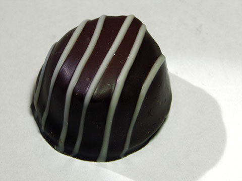 Photo of outside of See’s® Blueberry Truffle