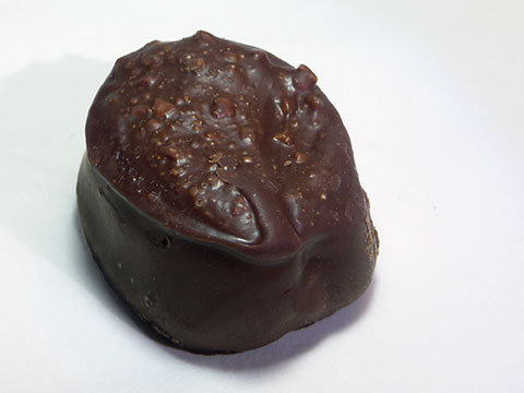 Photo of outside of See’s® Light Chocolate Truffle